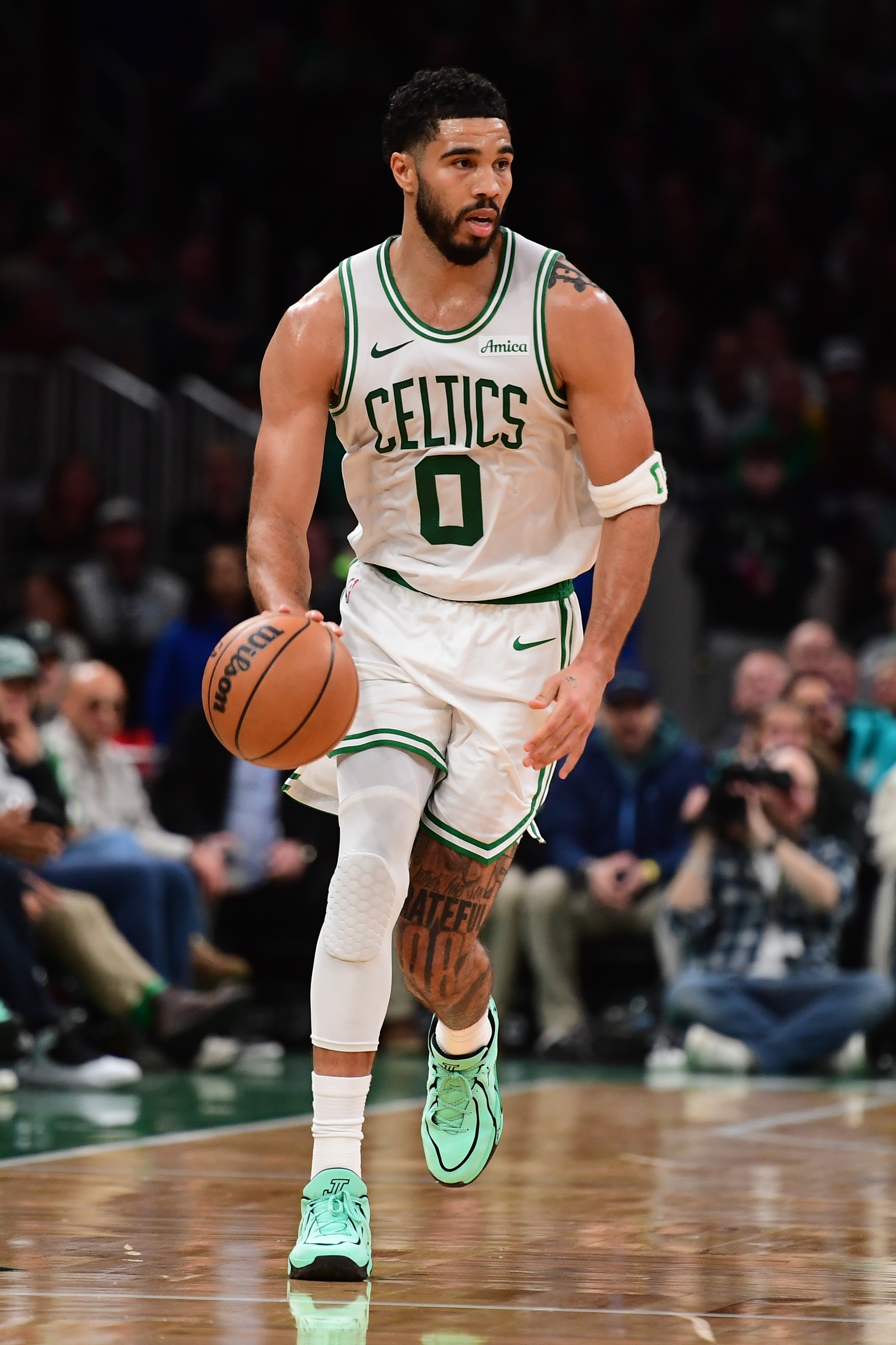 塔图姆32分率队轻取黄蜂 绿军锁定50胜剑指季后赛